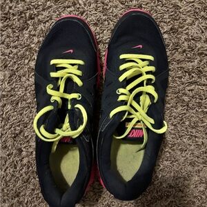 Nike Black Sneakers with Neon Yellow Laces and Pink Accents